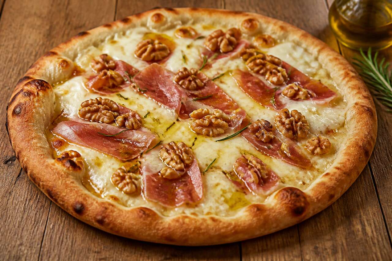 Recette de pizza au mascarpone, speck et noix : un délice à découvrir